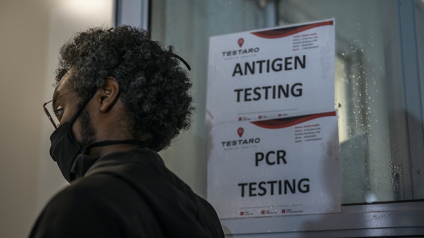 A person queues to be tested for COVID-19 in Johannesburg, South Africa