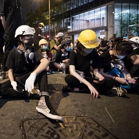 Protesters with the home made protective gears seen outside the police headquarters of Hong Kong.