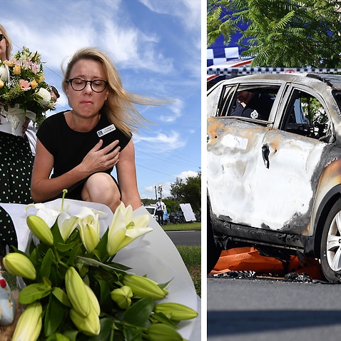 Floral tributes have been left at the scene of a fatal car fire in Brisbane yesterday morning. 