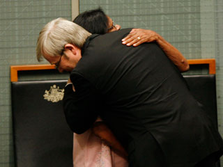 Kevin Rudd hugs an indigenous representative after delivering an historic apology