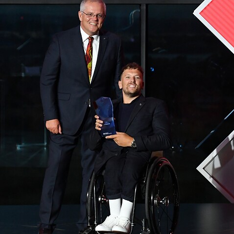 Prime Minister Scott Morrison and 2022 Australian of the Year winner Dylan Alcott during the 2022 Australian of the Year Awards ceremony, at the National Arboretum in Canberra, Tuesday, January 25, 2022.
