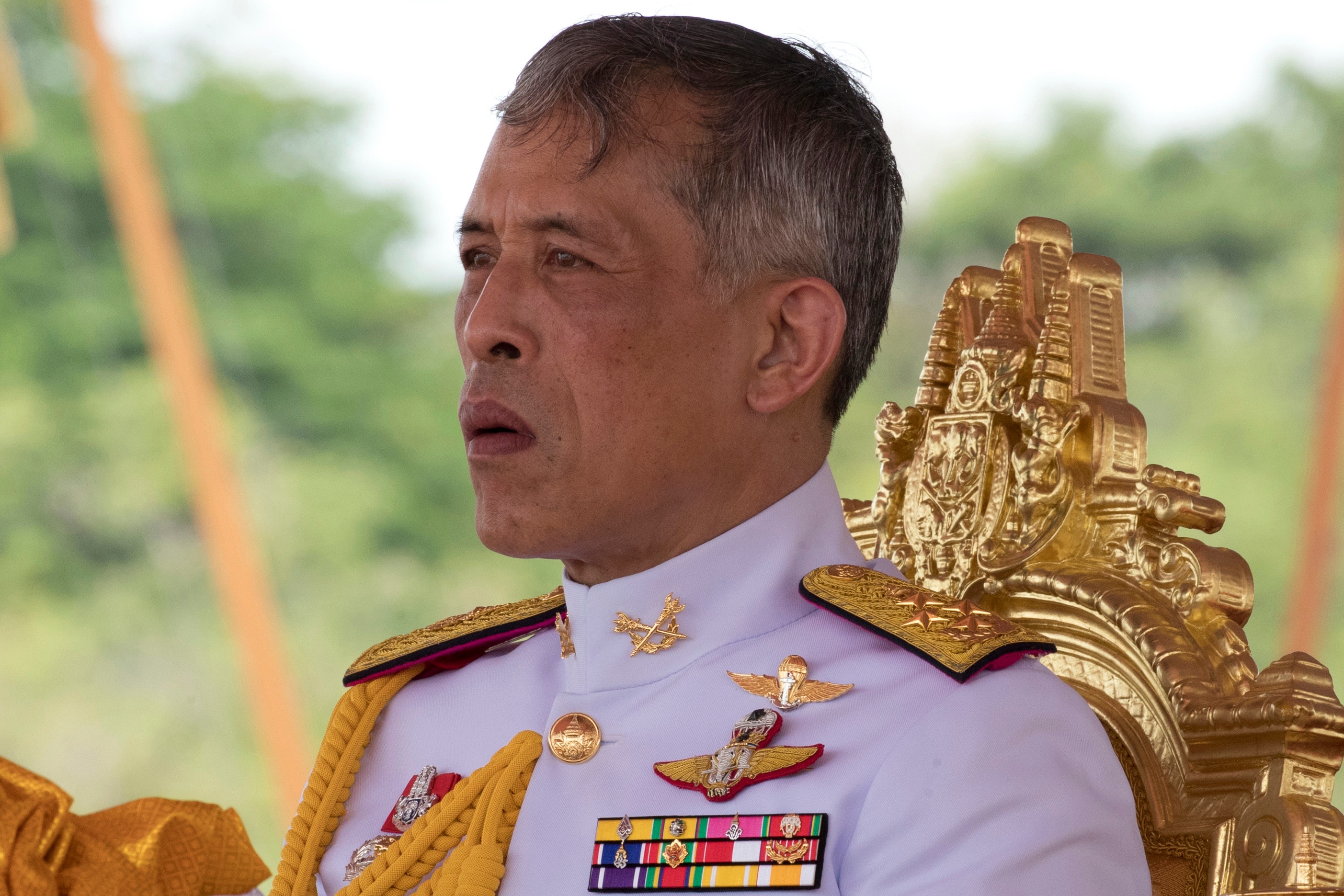 Thai King strips new royal consort of titles for 
