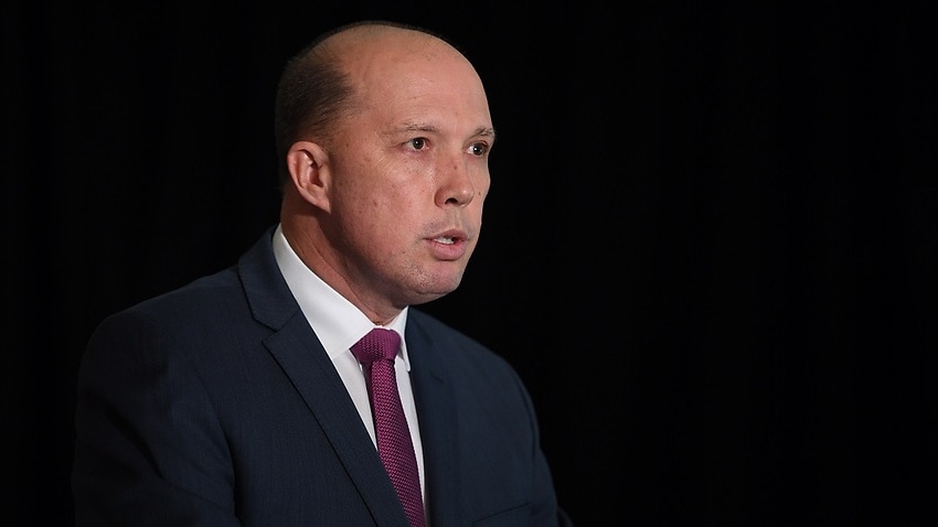 Australian Minister for Immigration and Border Protection Peter Dutton addresses an event to mark Refugee Week 2017 at Parliament House in Canberra, Tuesday, June 20, 2017. (AAP Image/Lukas Coch) NO ARCHIVING