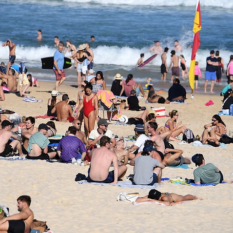 Sydneysiders enjoy a sunny day at Bondi Beach.