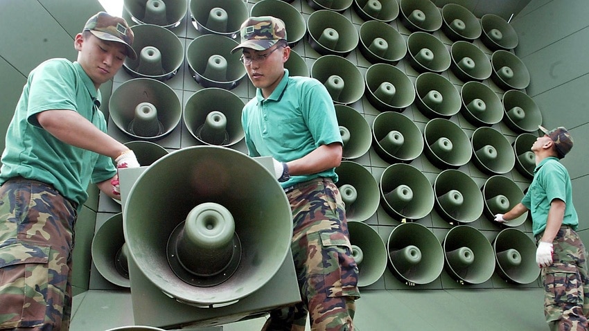 Hasil gambar untuk South Korean military suspends loudspeaker broadcasts at inter-Korean border