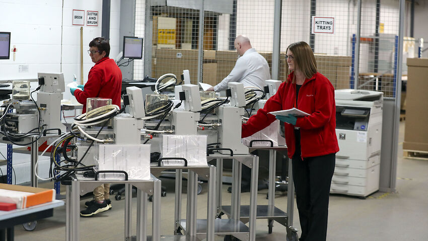 Staff test ventilators ahead of them being shipped out to the NHS, in Abingdon, England, Tuesday, 21 April, 2020.