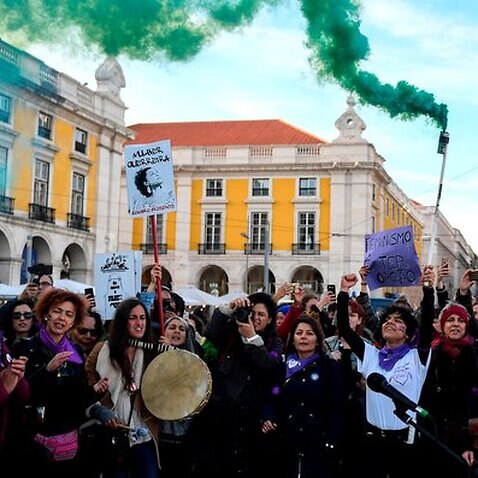People gather during a demonstration marking International Women's Day in Lisbon on March 8, 2019. (Photo by PATRICIA DE MELO MOREIRA / AFP)        (Photo credit should read PATRICIA DE MELO MOREIRA/AFP/Getty Images)