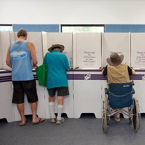 People in Darwin filling in their ballot papers at the last election (AEC)
