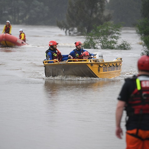 SES flood rescue and Surf Life Saving Association boats are seen on the Hawkesbury River at Sackville in north western Sydney on 23 March, 2021. 