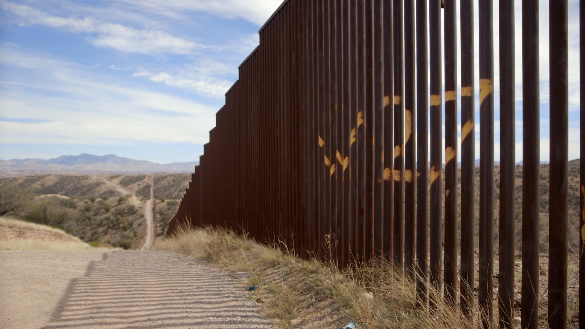 Border walls are already along much of the US-Mexico border (SBS Dateline) Border walls are already along much of the US-Mexico border.