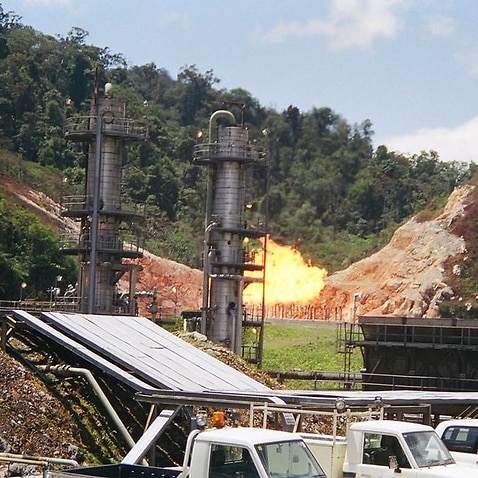 Gas flaring behind Oil Search Ltd's Kutubu operations in 2004