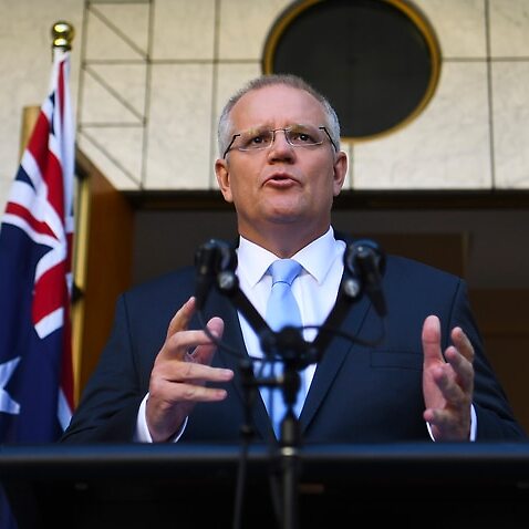 Image of Scott Morrison announcing the 18 May election date at a press conference.