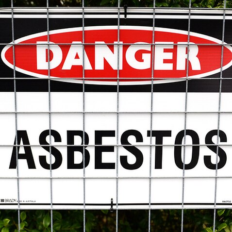 A stock image of an asbestos warning sign