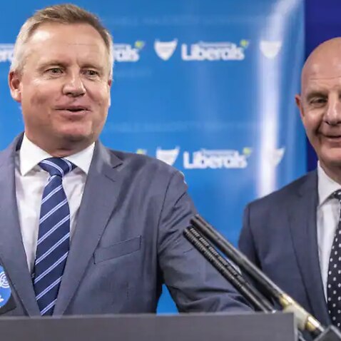 Jeremy Rockliff (left) has become Tasmania's premier following Peter Gutwein's (right) resignation. 