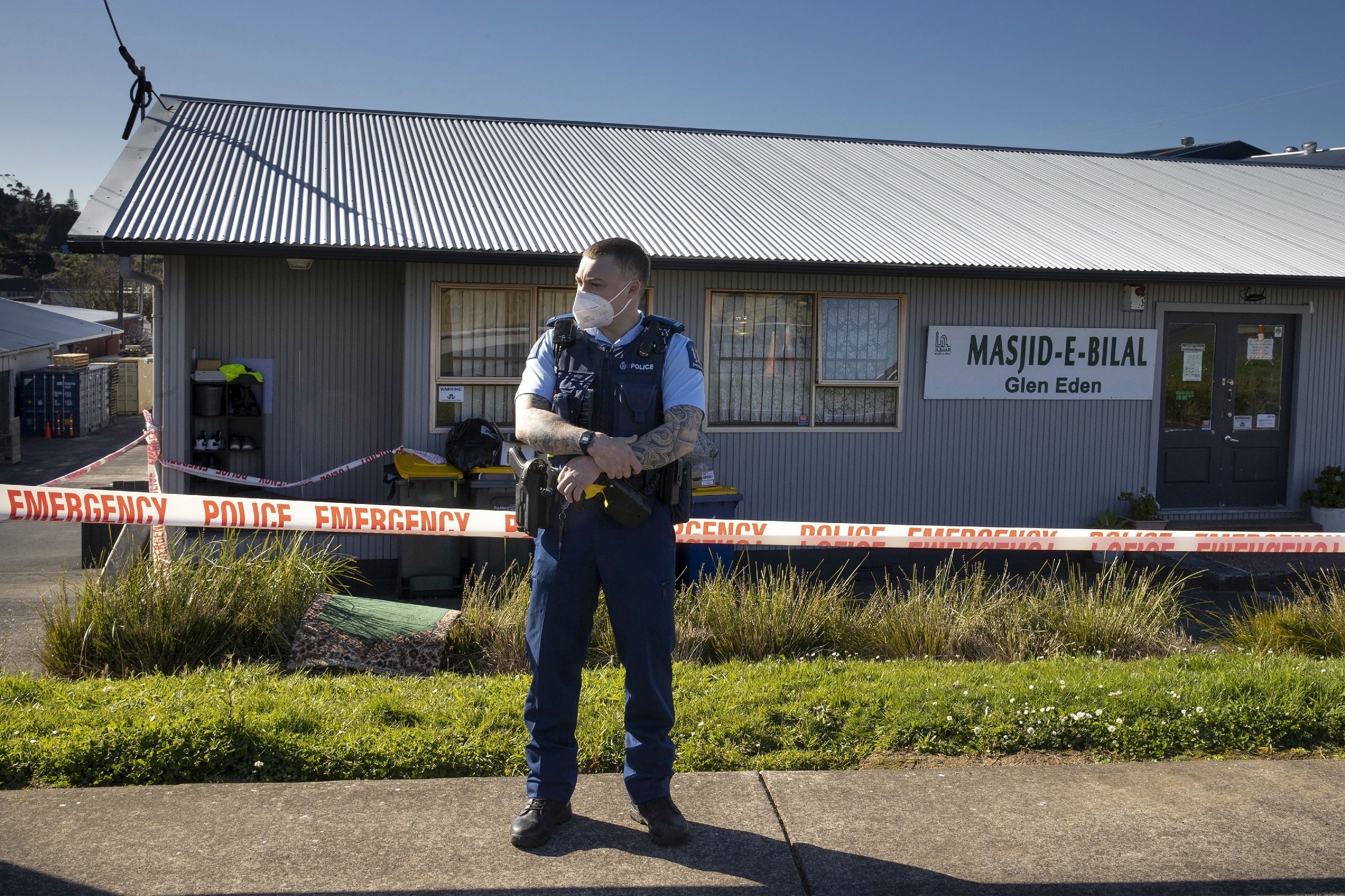 Police stand outside a mosque in Auckland, New Zealand on 4 September 2021.