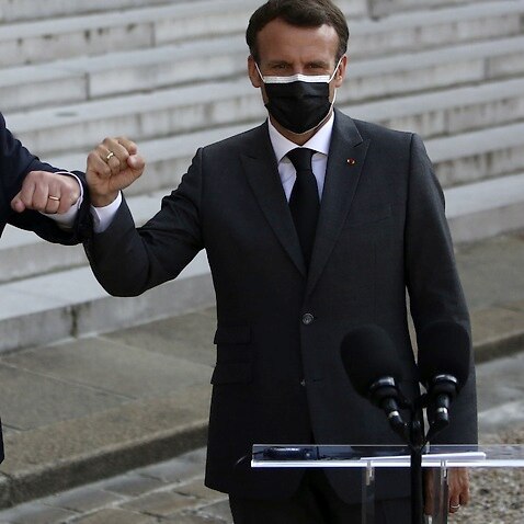 French President Emmanuel Macron and Australia's Prime Minister Scott Morrison in Paris on 15 June 2021. 