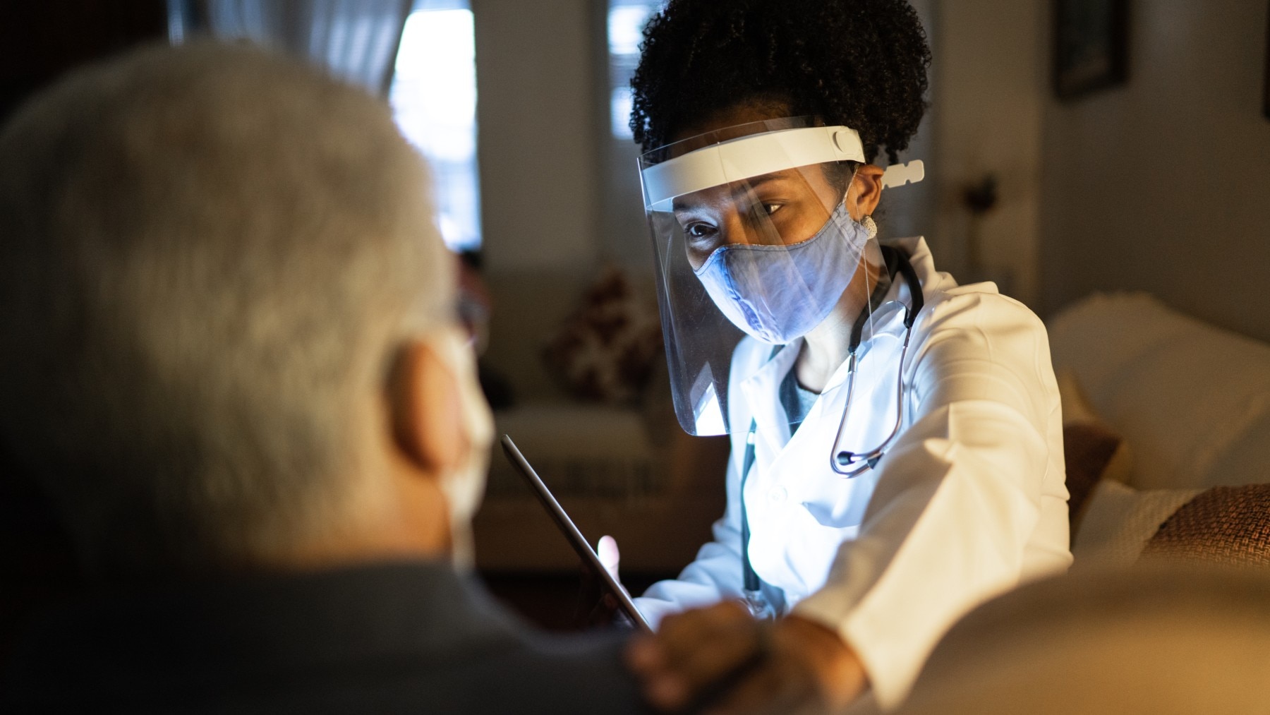 Nurse examining a patient 