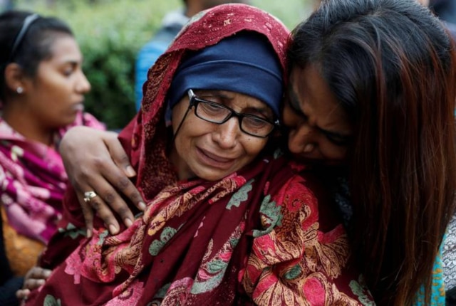 A day after the attack a woman waiting for news about missing loved ones reacts at a community centre near Masjid Al Noor. A day after the attack a woman waiting for news about missing loved ones reacts at a community centre near Masjid Al Noor.