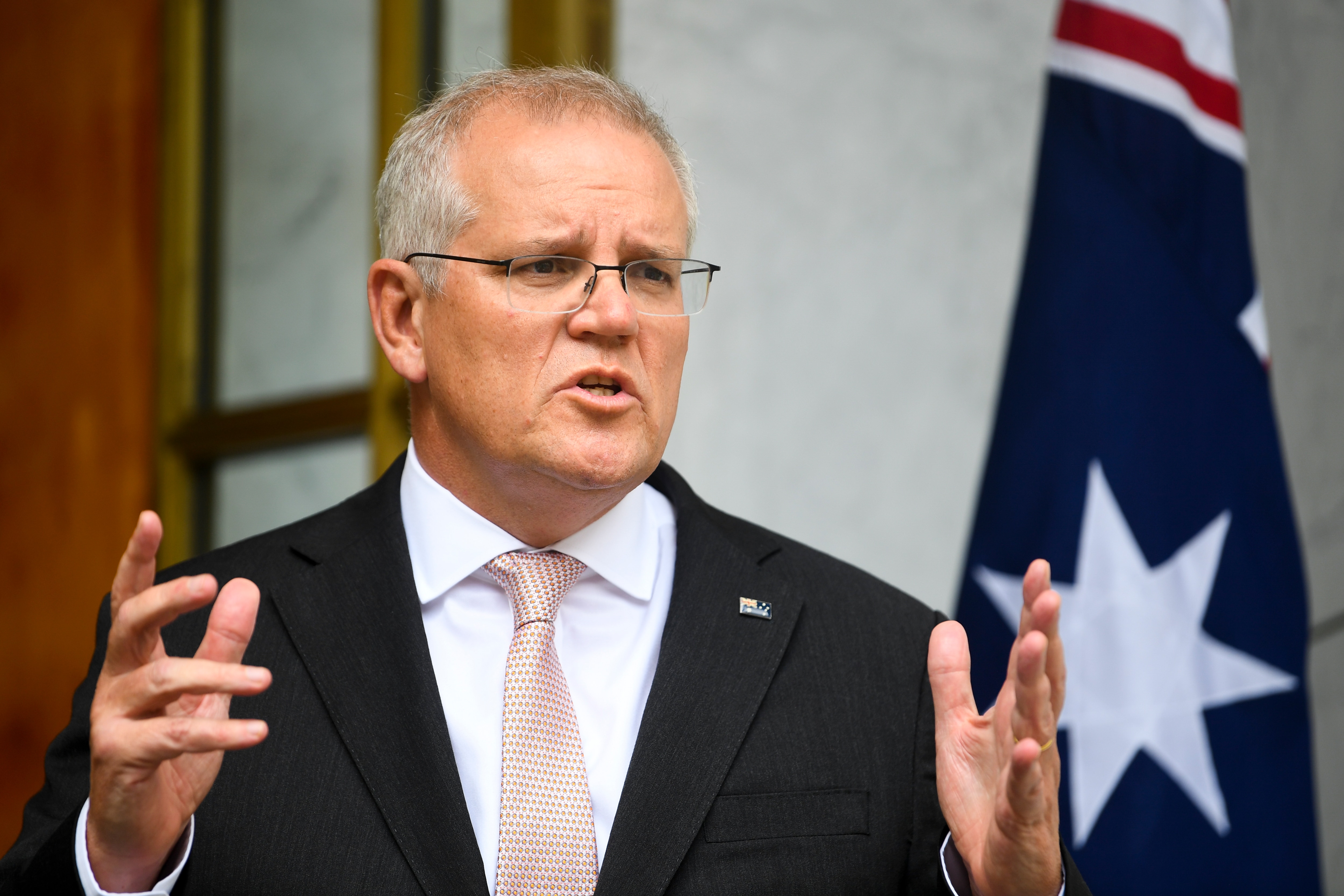 Australian Prime Minister Scott Morrison speaks to the media during a press conference following a national cabinet meeting, at Parliament House in Canberra.