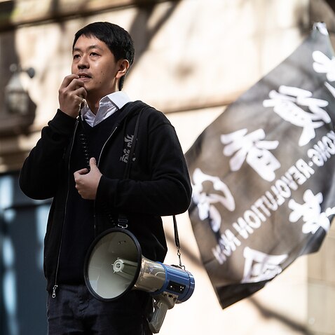 Former Hong Kong Politician Ted Hui speaking during a rally to show concern for the increasing Chinese influence in Australia and to show support to Hongkongers, in Sydney, Saturday, June 12, 2021. (AAP Image/James Gourley) NO ARCHIVING