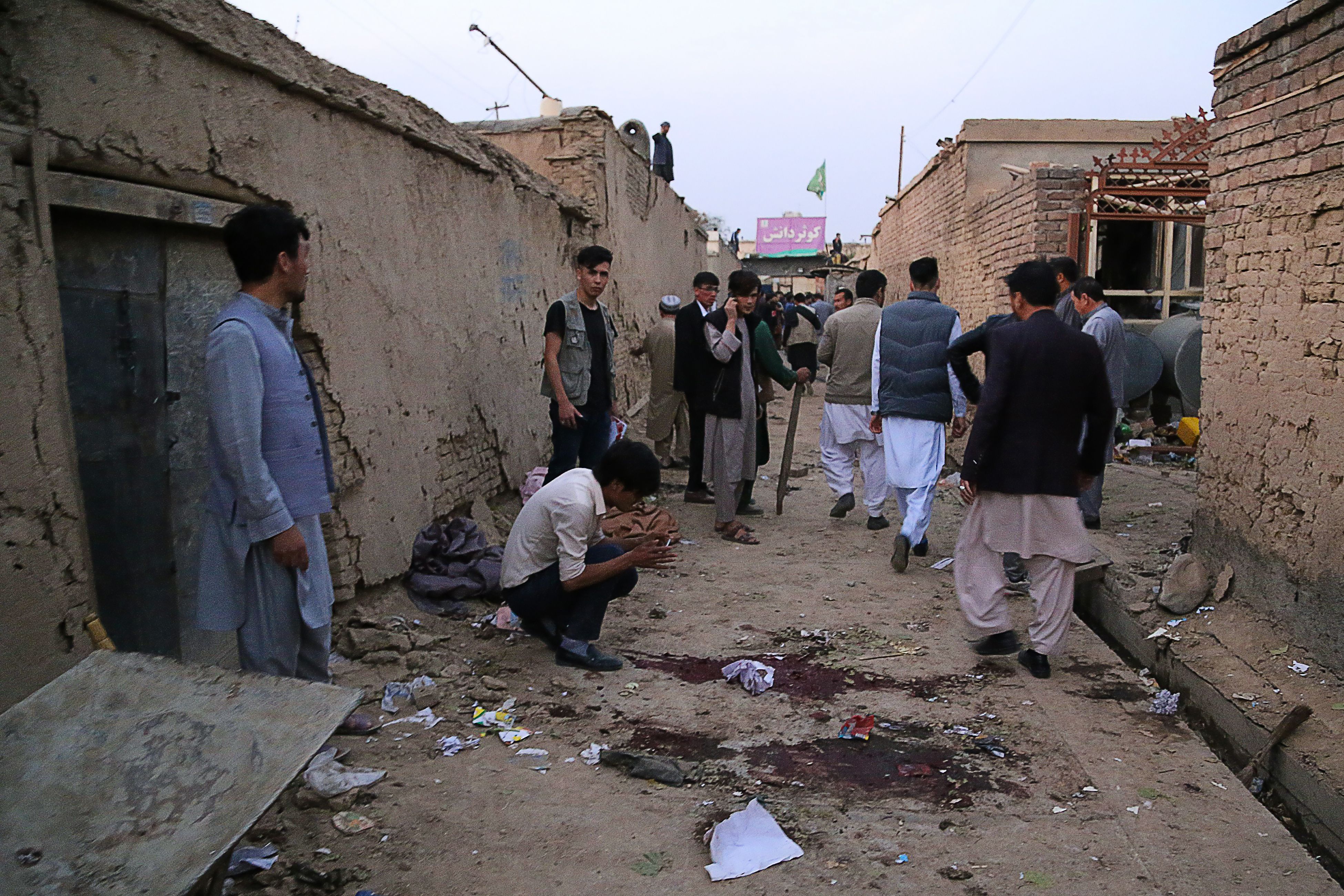 Residents gather after a suicide bombing in an education centre in Kabul in October. 