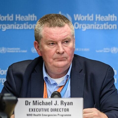 A file photo of WHO Health Emergencies Programme Director Mike Ryan and WHO Director-General Tedros Adhanom Ghebreyesus.