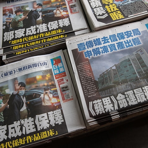 epa09294670 Copies of Apple Daily newspaper are for sale at a newsstand in Hong Kong, China, 23 June 2021. The owner of the newsstand decided not to return the copies from the previous days and to keep on selling them. Apple Daily's management is expected
