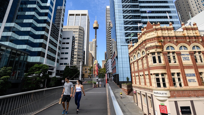 People walking in a quiet part of the CBD, in Sydney.