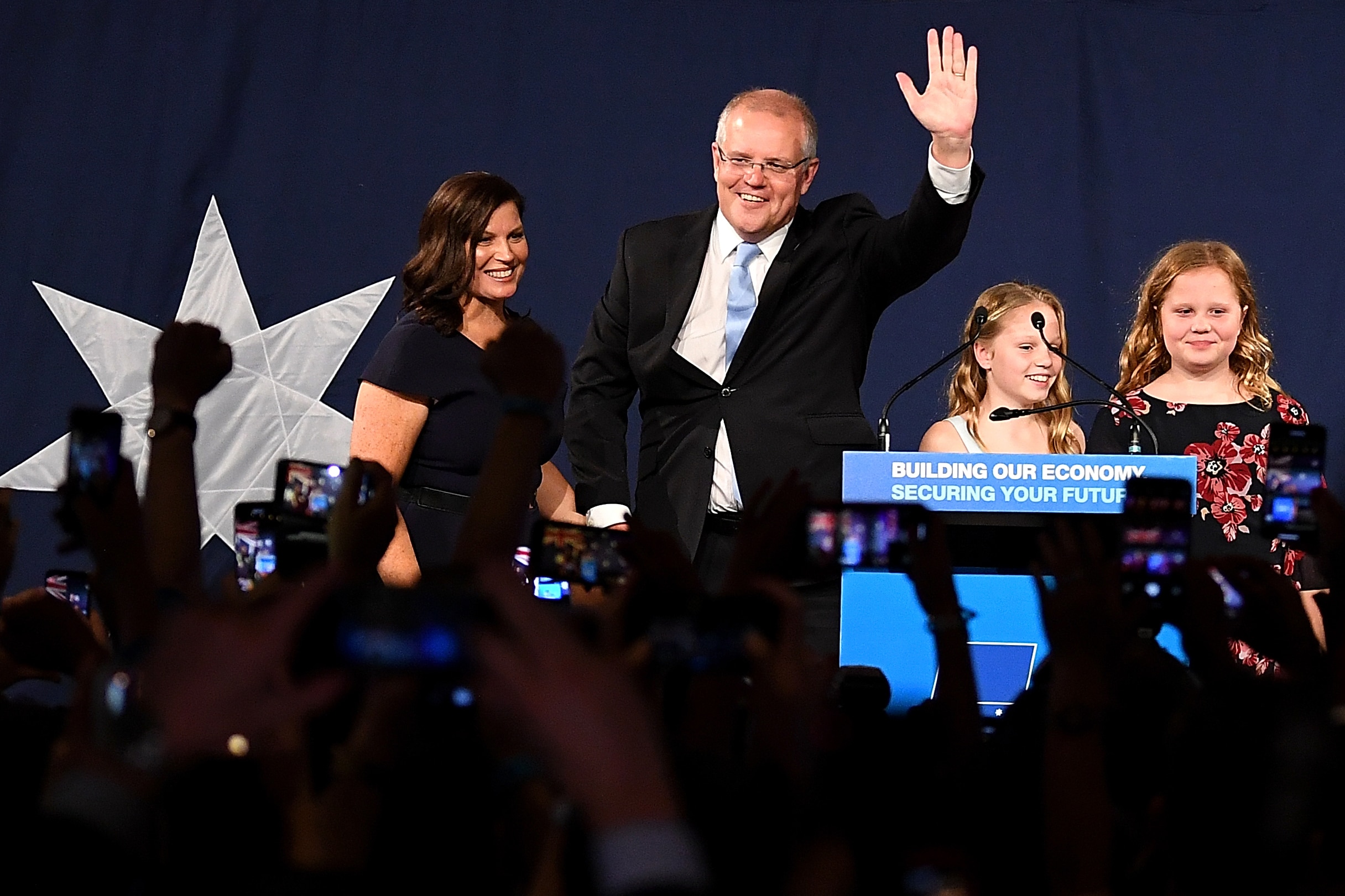 Australian Prime Minister Scott Morrison celebrates a remarkable victory.