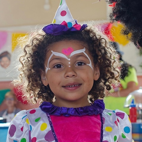 photo of a small girls dressed up for carnival