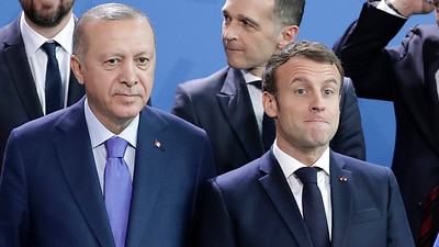 A file photo of Turkish President Recep Tayyip Erdogan and French President Emmanuel Macron.