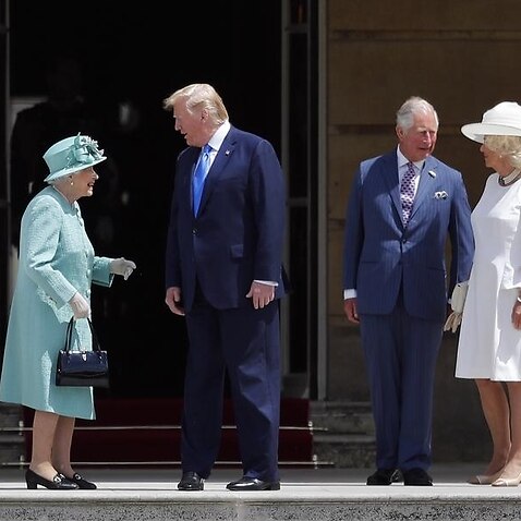 Donald Trump meets the Queen at Buckingham Palace.