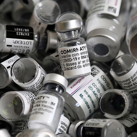 Empty vials of the Pfizer COVID-19 vaccine