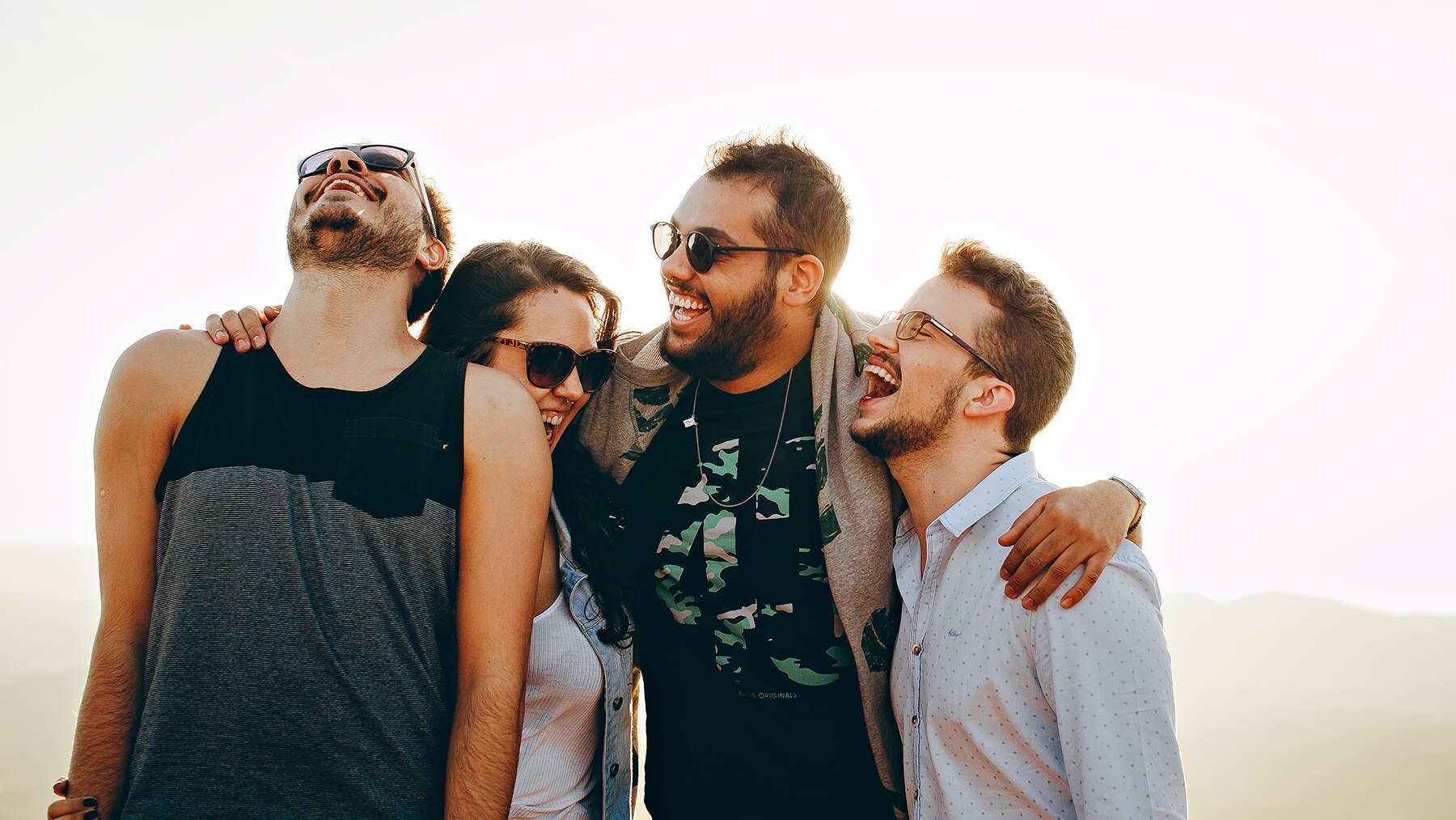 People laughing. Credit - Pexels Helena Lopes 1800x1013