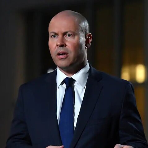 Treasurer Josh Frydenberg says he stands by the prime minister and completely rejects the allegations of involvement in a racial vilification campaign. 