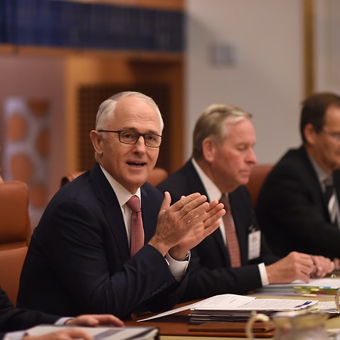 Australian Prime Minister Malcolm Turnbull (centre) speaks during a meeting of the Council of Australian Governments (COAG) at Parliament House in Canberra