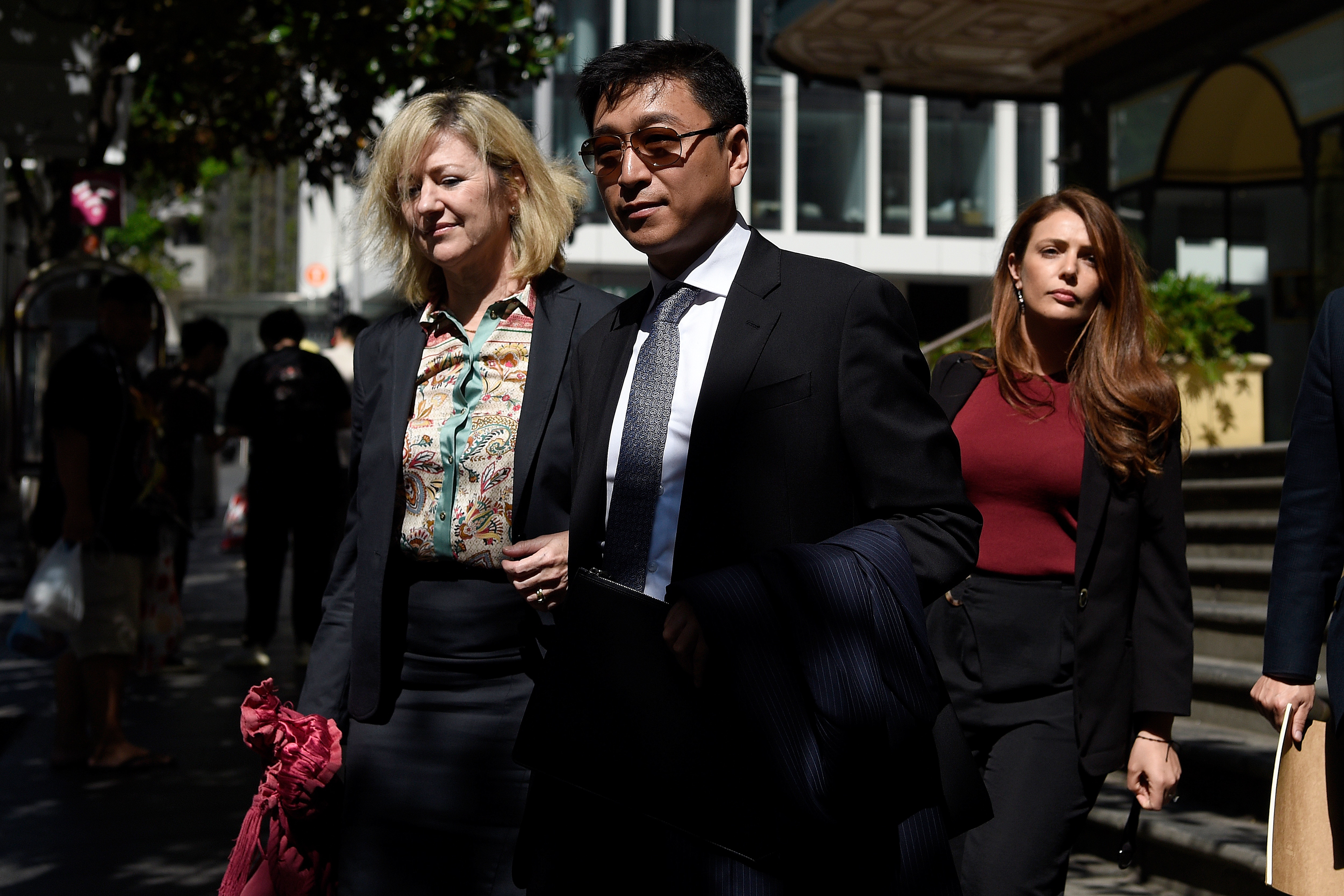 Producer Jing Wang (centre) was also cleared of all charges.Producer Jing Wang (centre) was also cleared of all charges.