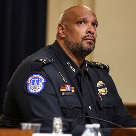 US Capitol Police officer Harry Dunn becomes emotional as he testifies before the House Select Committee investigating the January 6 attack on the US Capitol