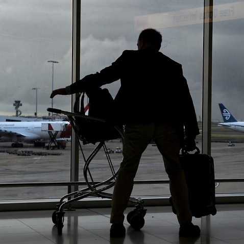 File image of tourist at the international airport in Sydney.