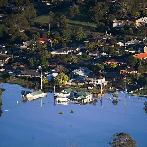 Buildings are partially submerged in a floodwater in the Windsor area, northwest of Sydney