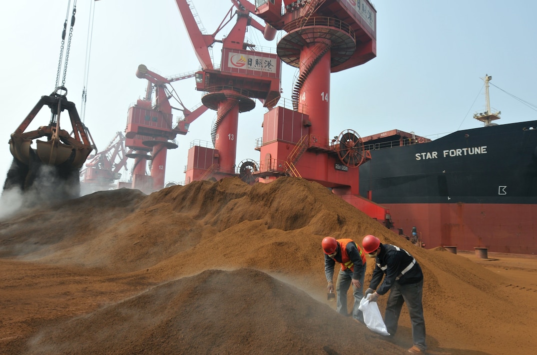 Iron ore from Australia is unloaded in China.