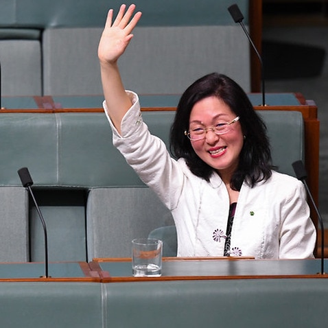 The Member for Chisholm Gladys Liu waves after delivering her maiden speech in the House of Representatives at Parliament House in Canberra, Tuesday, 23 July, 2019. (AAP Image/Lukas Coch) NO ARCHIVING