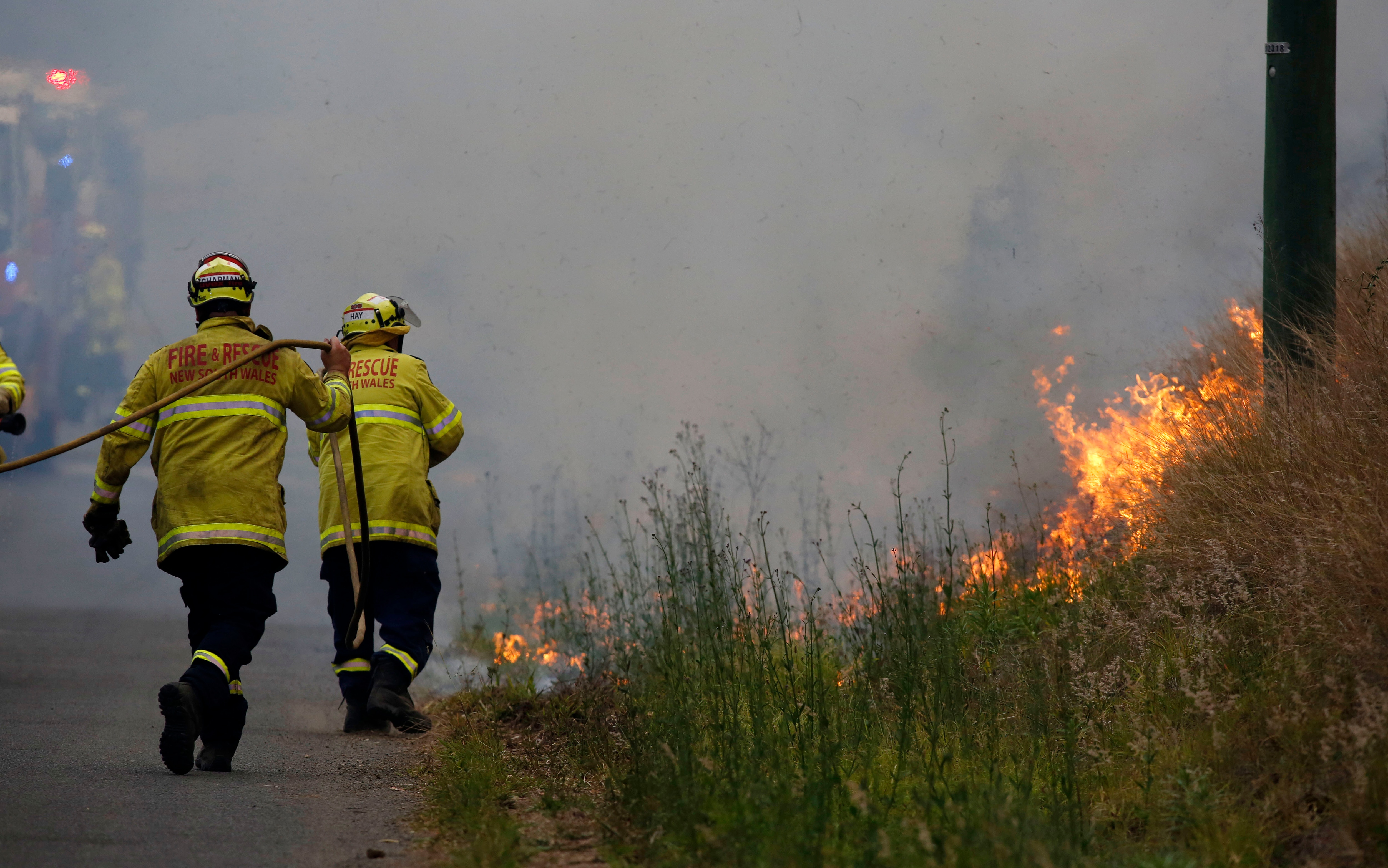Firefighters work on a controlled burn just South of Taree.