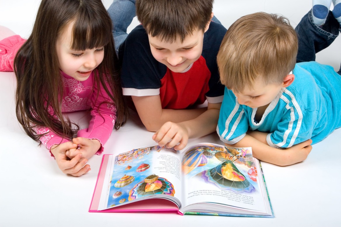 Children reading book.