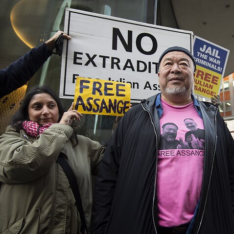 Chinese contemporary artist and activist Ai Weiwei during a silent protest outside the Old Bailey in London in support of Julian Assange.