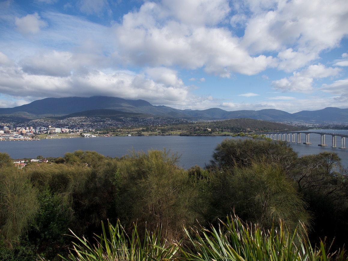 Hobart to the left in the foothills of kunanyi/Mount Wellington.