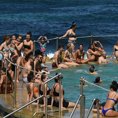 People cool off in the pool during heatwave conditions at Bronte Beach in Sydney.