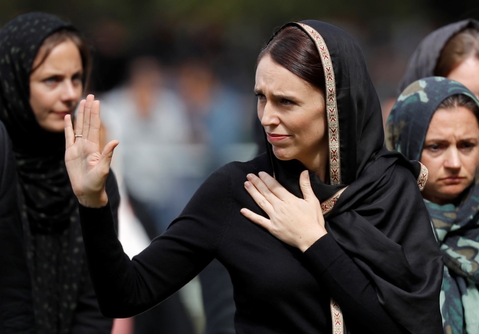 New Zealand Prime Minister Jacinda Ardern, center, waves as she leaves Friday prayers at Hagley Park in Christchurch. New Zealand Prime Minister Jacinda Ardern, center, waves as she leaves Friday prayers at Hagley Park in Christchurch.