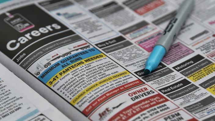 Stock image of a classifieds job section within the Herald Sun newspaper in Melbourne, Thursday, March 21, 2019. Australia's unemployment rate edged down in February to a seasonally adjusted 4.9 per cent. (AAP Image/James Ross) NO ARCHIVING