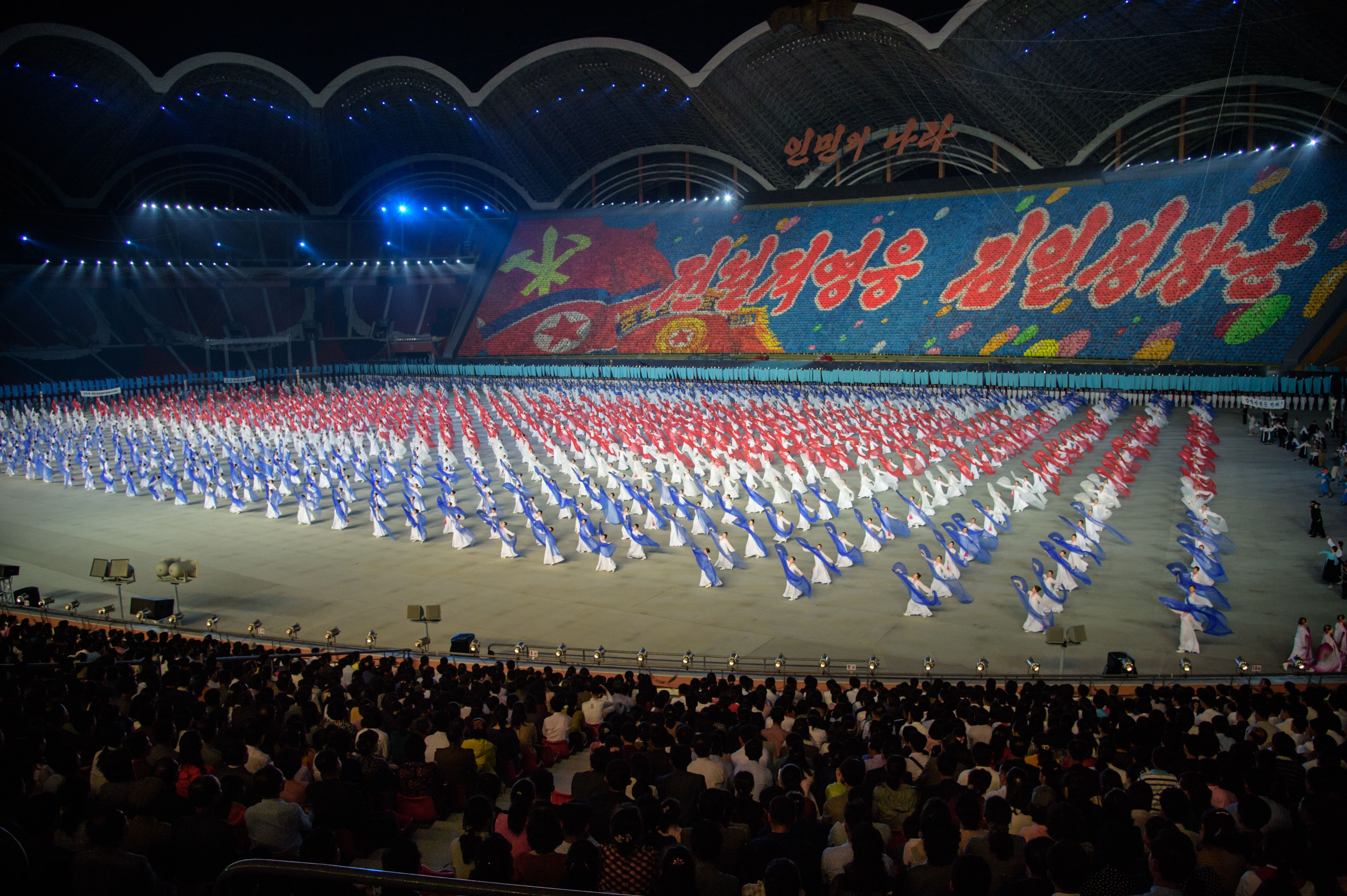 A photo taken on June 4, 2019 shows a 'Grand Mass Gymnastics and Artistic Performance', or mass games, at the May Day stadium in Pyongyang. A photo taken on June 4, 2019 shows a 'Grand Mass Gymnastics and Artistic Performance', or mass games, at the May Day stadium in Pyongyang. - The "Grand Mass Gymnastics and Artistic Performance" features enormous numbers of people -- mostly students and c